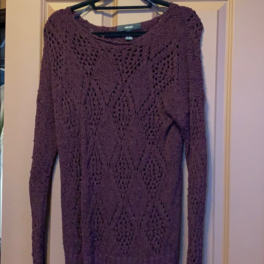 Maroon/ mauve sweater.